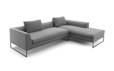 Graues Mell Lounge Sofa mit Recamiere und Kissen auf filigranem, schwarzem Metallgestell. Modernes Design.